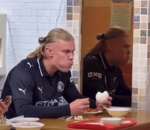 Erling Haaland startled by his own reflection in a mirror